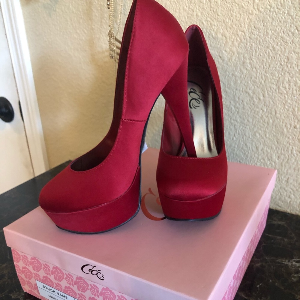 Satin red pumps